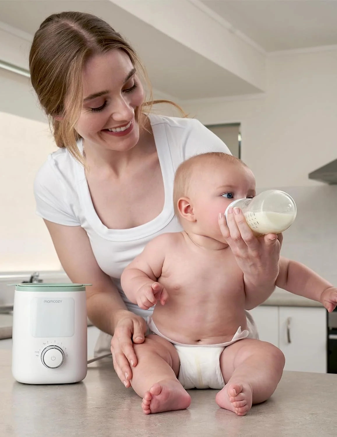 Momcozy MW02 Nutri Smart Analog – Ngrohës Multifunksional për Shishe të Bebeve, i Bardhë