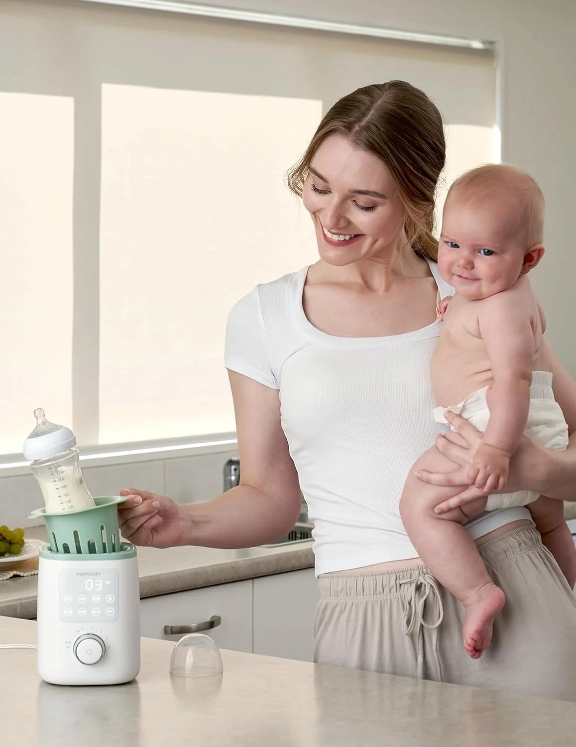 Momcozy MW02 Nutri Smart Analog – Ngrohës Multifunksional për Shishe të Bebeve, i Bardhë